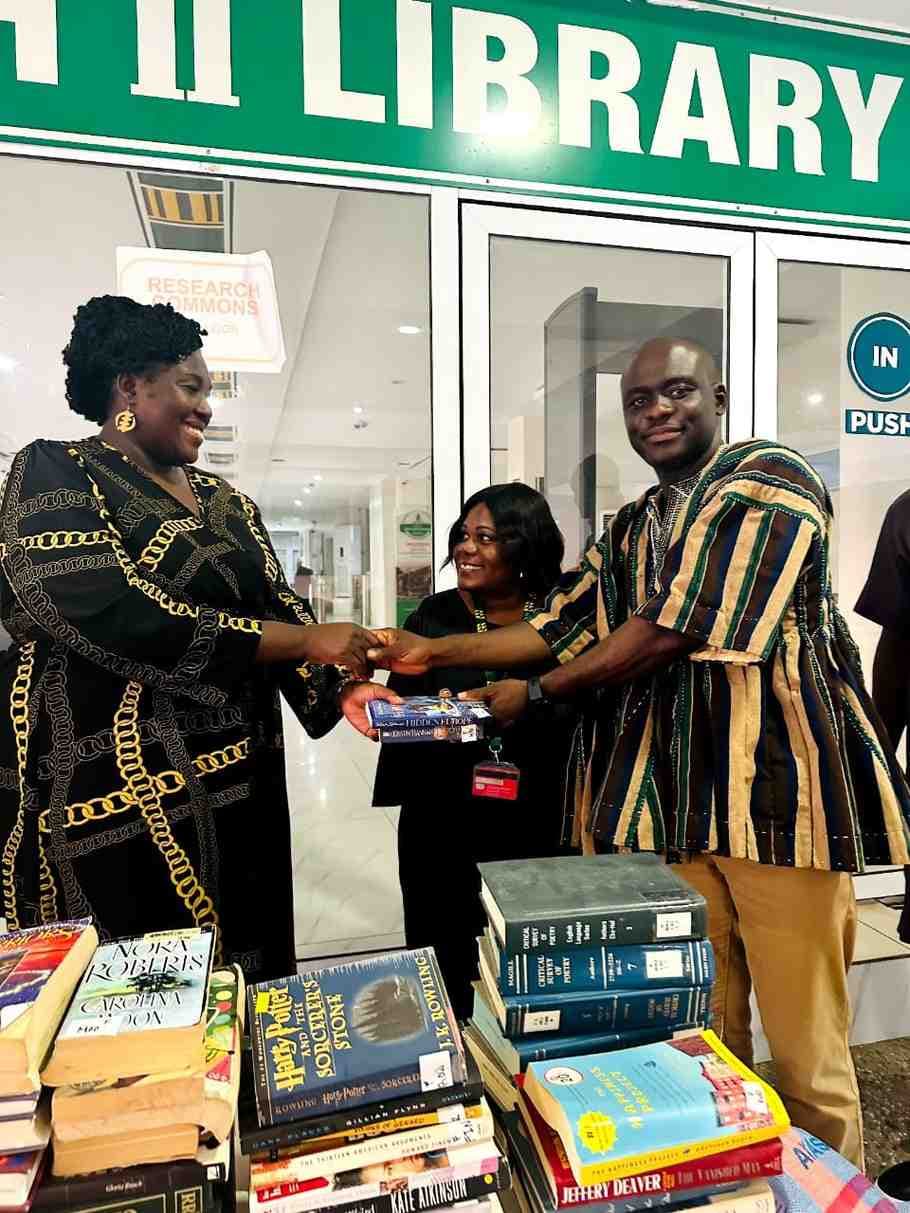 Students using the donated books at KNUST library